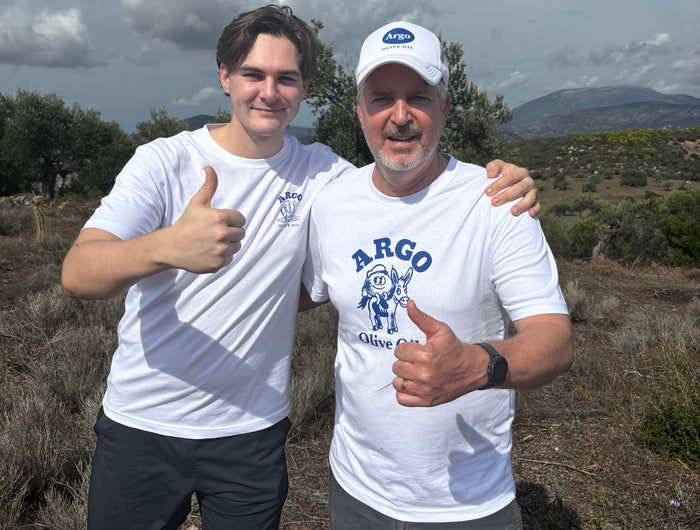 <h2>Meet the slightly accidental business owners of Argo</h2><p>We’re Noam and Chris. A father-son crew who, until 2025, were just two more guys stuck in regular office jobs.</p><p>One day, we looked up from our spreadsheets and just said, "Enough." We wanted to do something we actually <em>loved</em>. Something that connected us to ridiculously good food and our family in Ermioni, Greece, right in the heart of Argolis.</p><p>Every time we visited, we were floored by the local passion for olive oil. Their appreciation for <em>real</em>, high-quality stuff blew us away.</p>